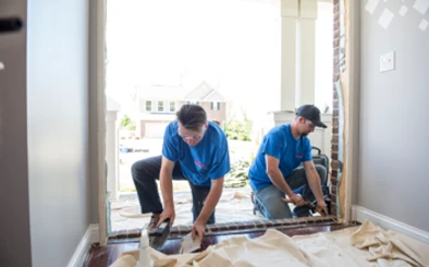 Champion installer perparing and cleaning opening