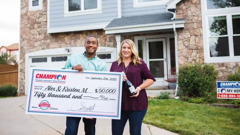 Champion contest winners with check