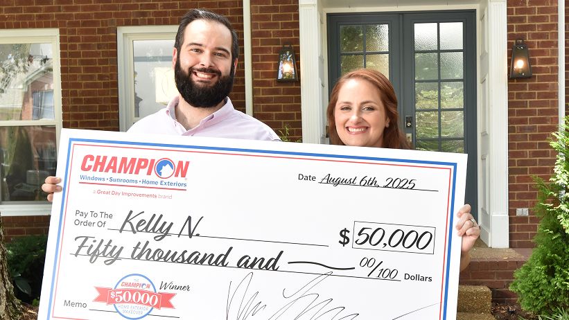 Champion contest winners with check