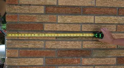 Champion installer making measurements