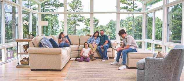 Champion sunroom interior with family