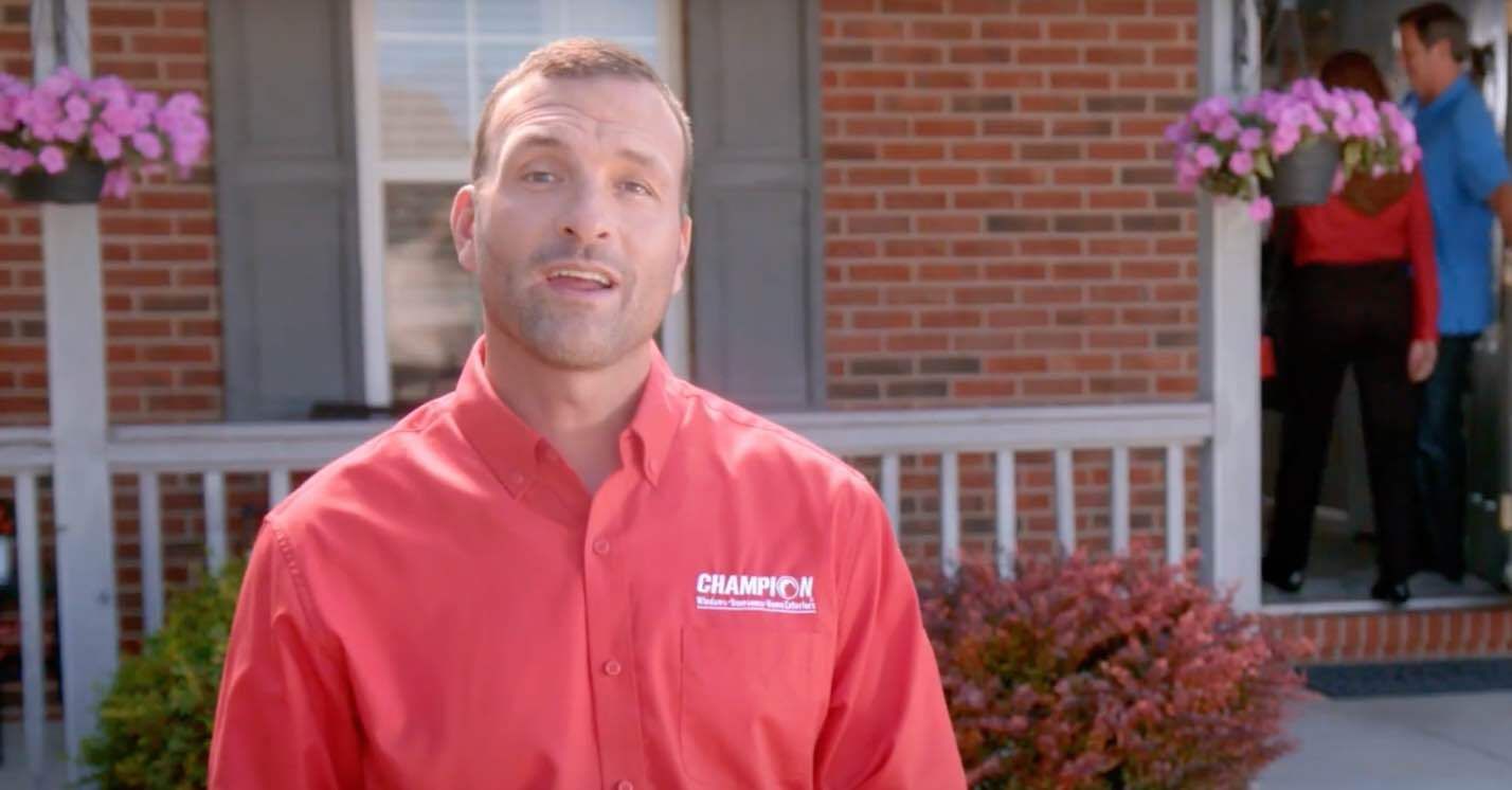 Champion employee explaining sunroom installation