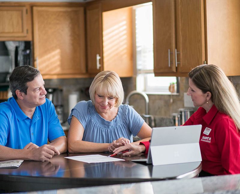 Champion representative talking to customers