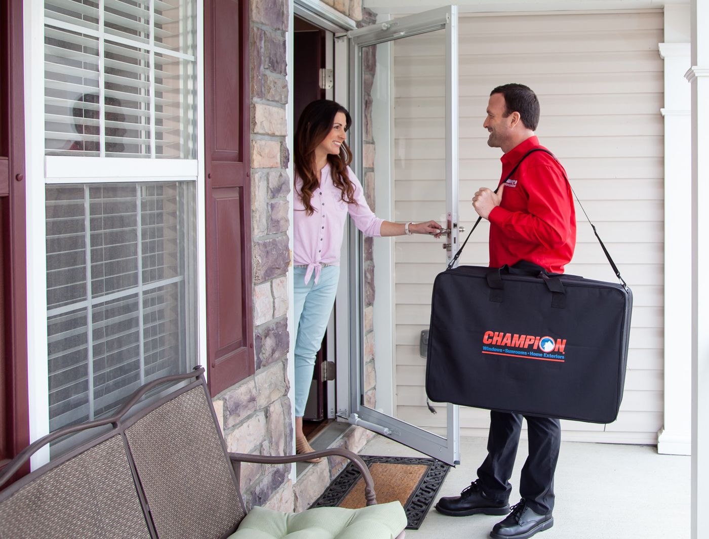 Champion greeting customer at the front door