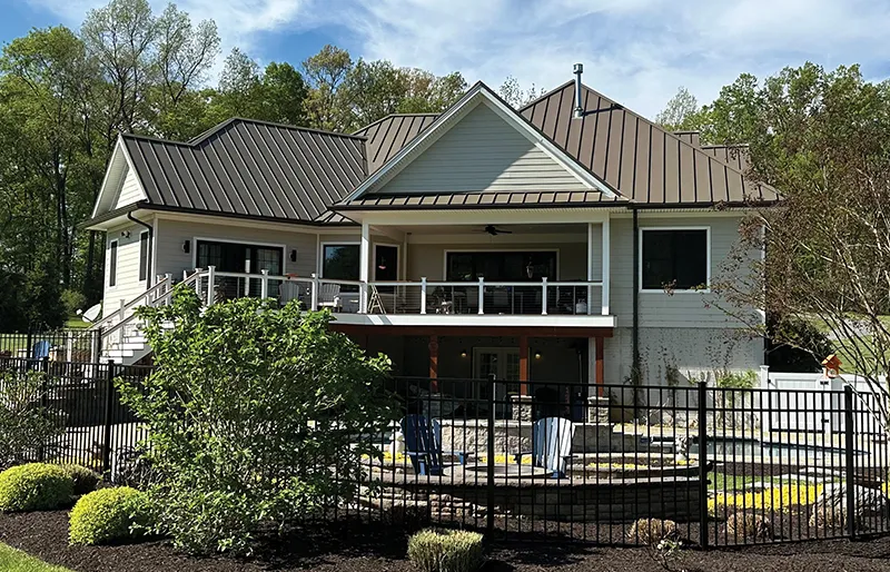 Home with metal standing seam roofing