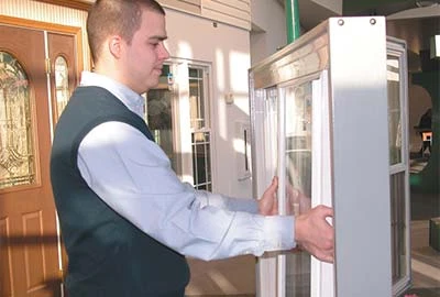 Person holding left and right side of slider window