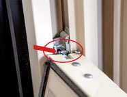 Pivot bars (B) are located on the window sash