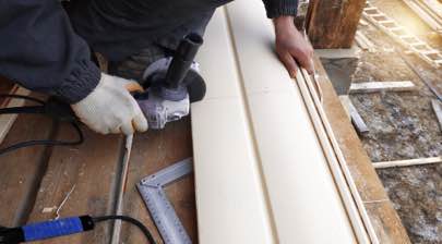 Champion installer working on new siding