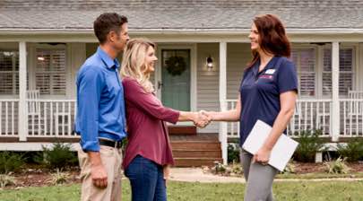 Champion employee greeting customers
