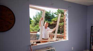 Champion installer removing old window frame