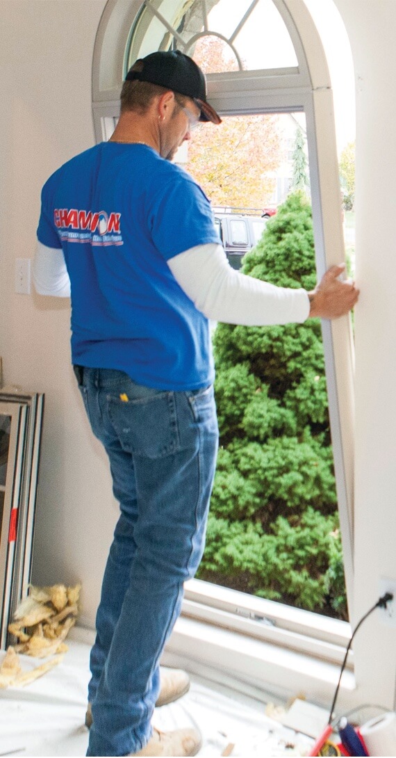 Replacement Windows Sunrooms Doors Siding Champion Champion Employee Installing Windows