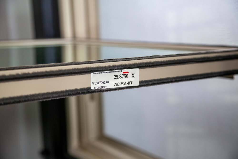 Showing the window tag on the manufacturing label on the inside of the window sash.